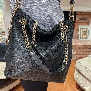 Michael Kors black leather bag.